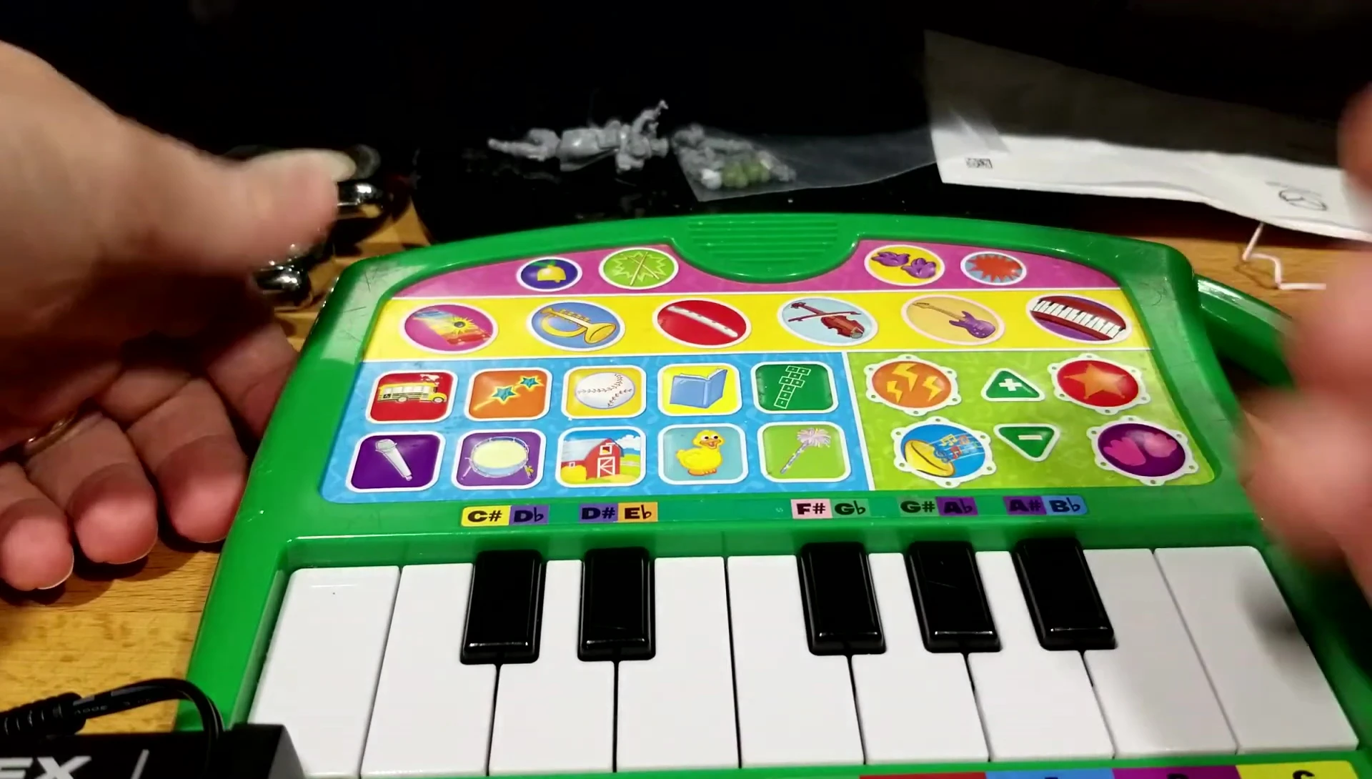Demonstrating the limited octave range while playing.