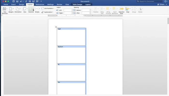 Go to 'Layout' and center align the text within the table cells.