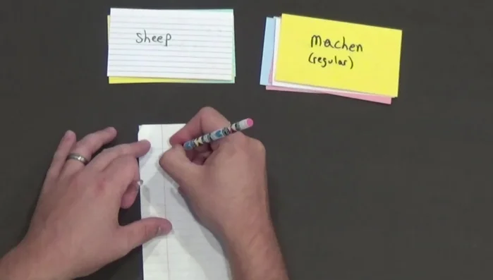 Fold a piece of paper in half.