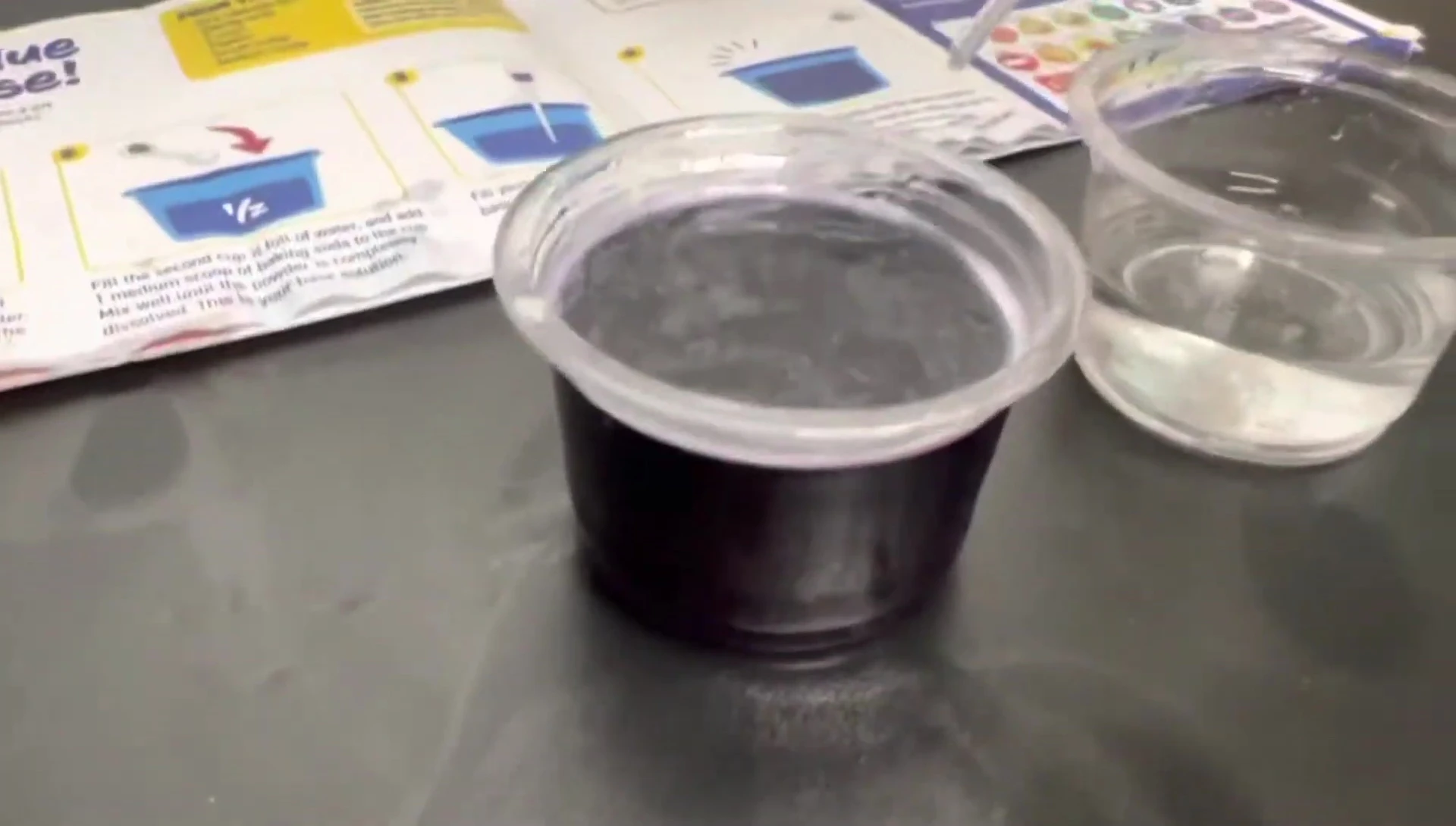 The solution turning blue after adding the baking soda