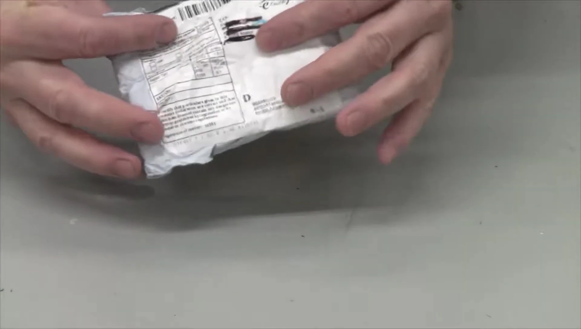 The small package containing the solar car kit.