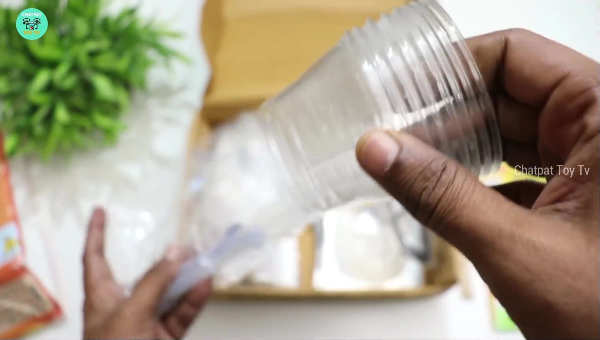Various plastic cups and cotton