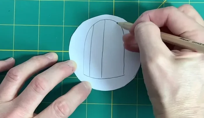 Draw a bird in the middle of the card, ensuring it's not upside down when the card is spun. Color it in.