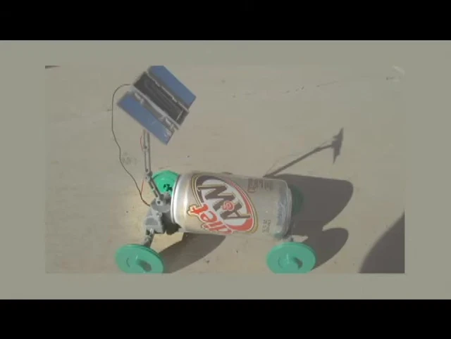 The wheels of the solar-powered vehicle in motion.