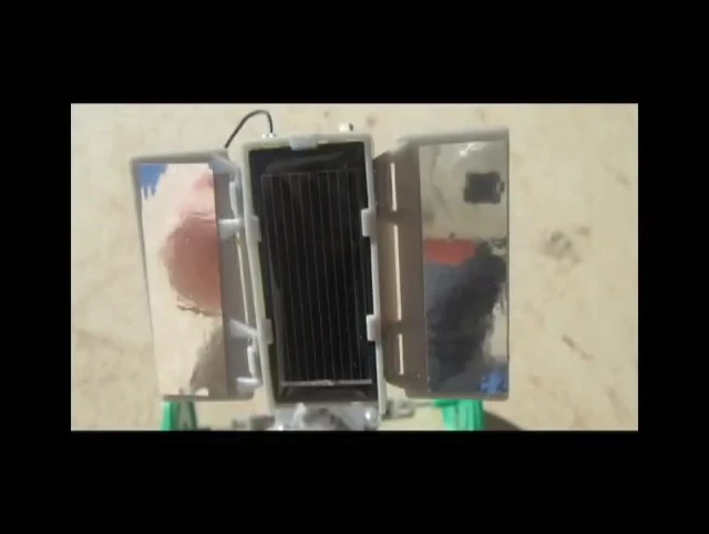 Close-up of solar panel showing sunlight hitting its surface.