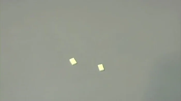 Assemble Solar Module: Attach double-sided tape to B10, insert solar panel wires, and press firmly.