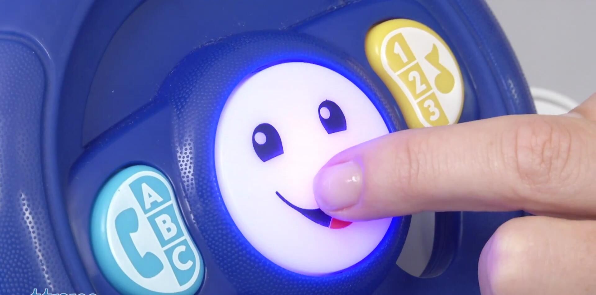 Close-up of the pretend radio and phone on the dashboard