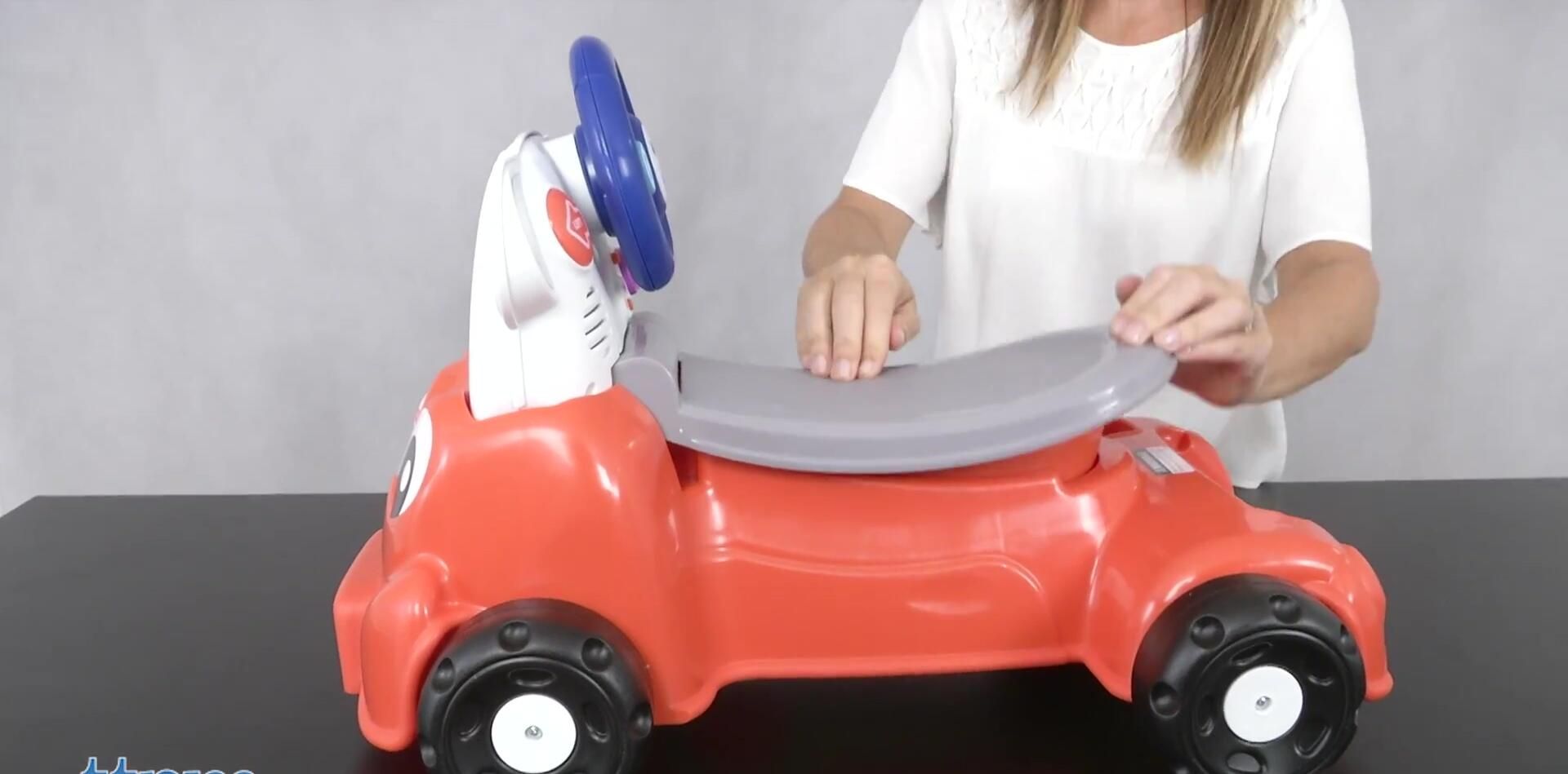 Child using the car as a cruiser