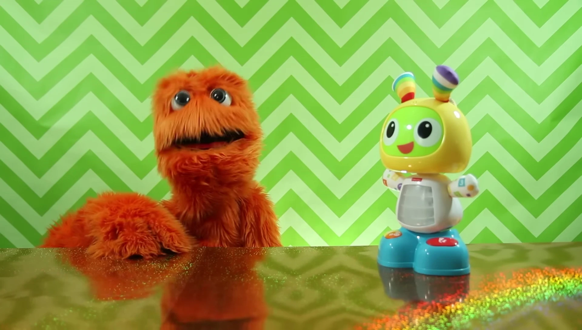 Close-up of the robot's feet, showing the buttons.