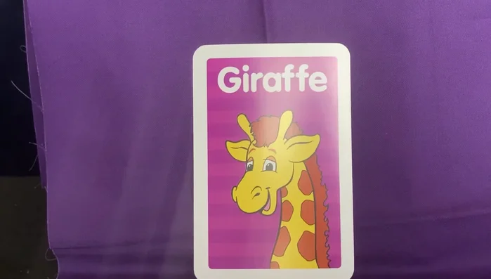 Provide examples of words that rhyme with 'giraffe' (laugh, staff, calf, graph, half, carafe).