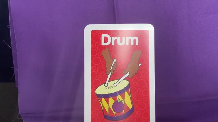 Provide examples of words that rhyme with 'drum' (thumb, come, swam, bum).