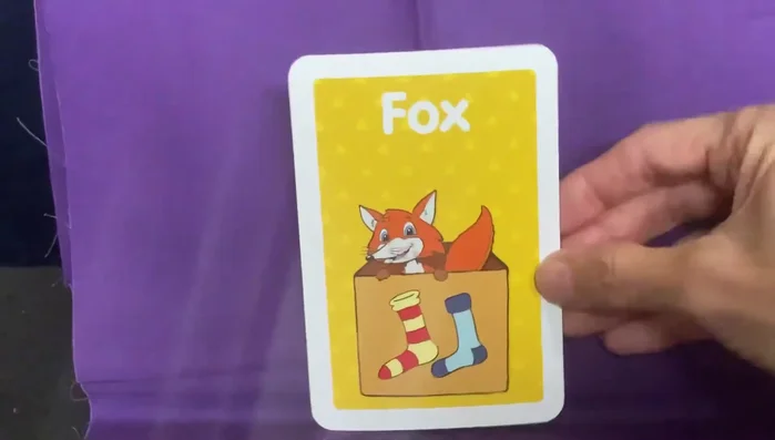Provide examples of words that rhyme with 'fox' (box, docks, frocks, flocks, locks, knocks, socks, ox, rocks, blocks, stocks, clocks).