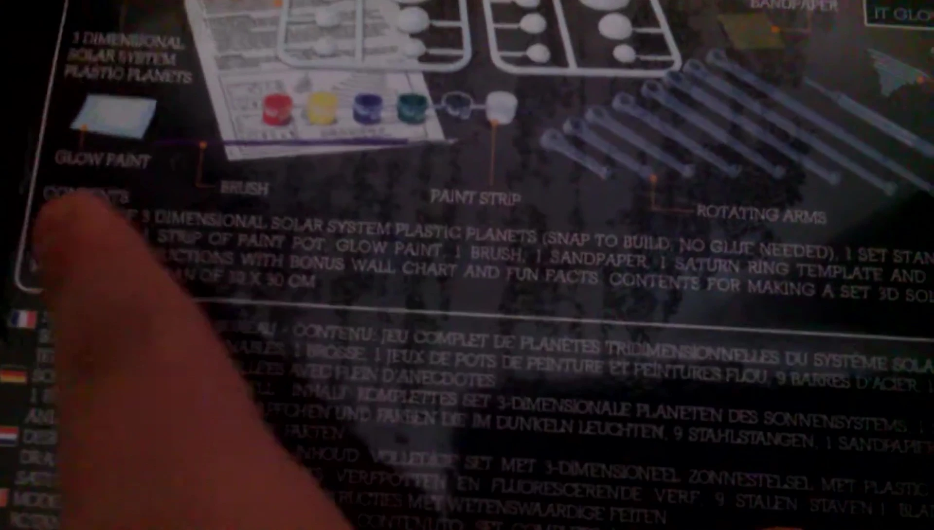 The reviewer preparing to glue the planets onto the template.