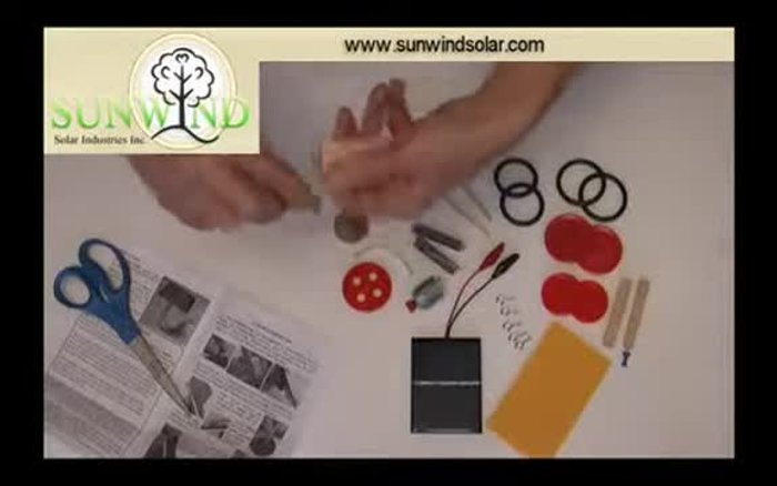 Smooth the ends of the axles using sandpaper folded in half and twisted.