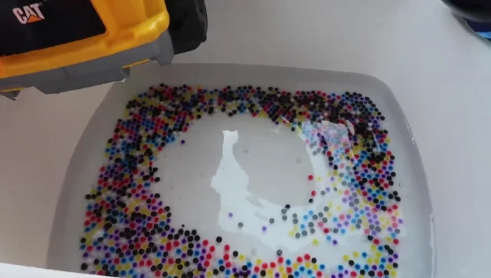 Let the water beads grow and then use them in different ways