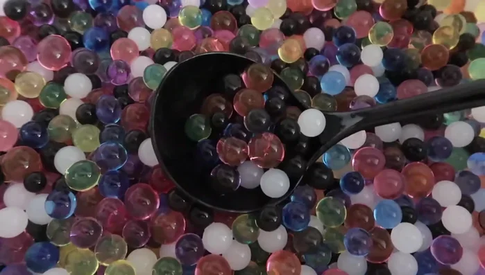 Hide toys inside the water beads.