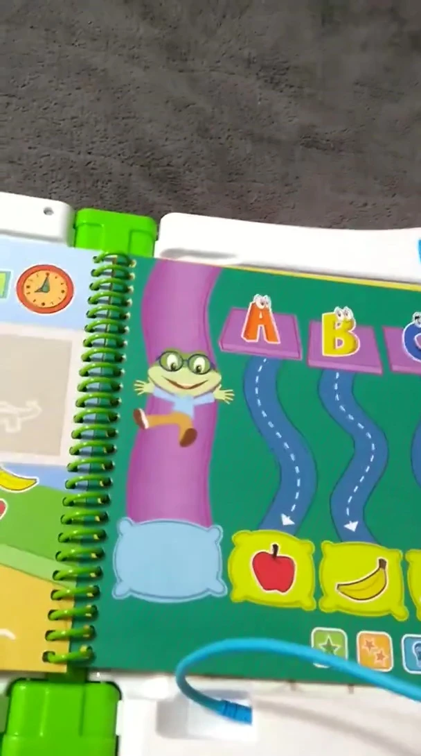 The sampler book opened to an early-level page.