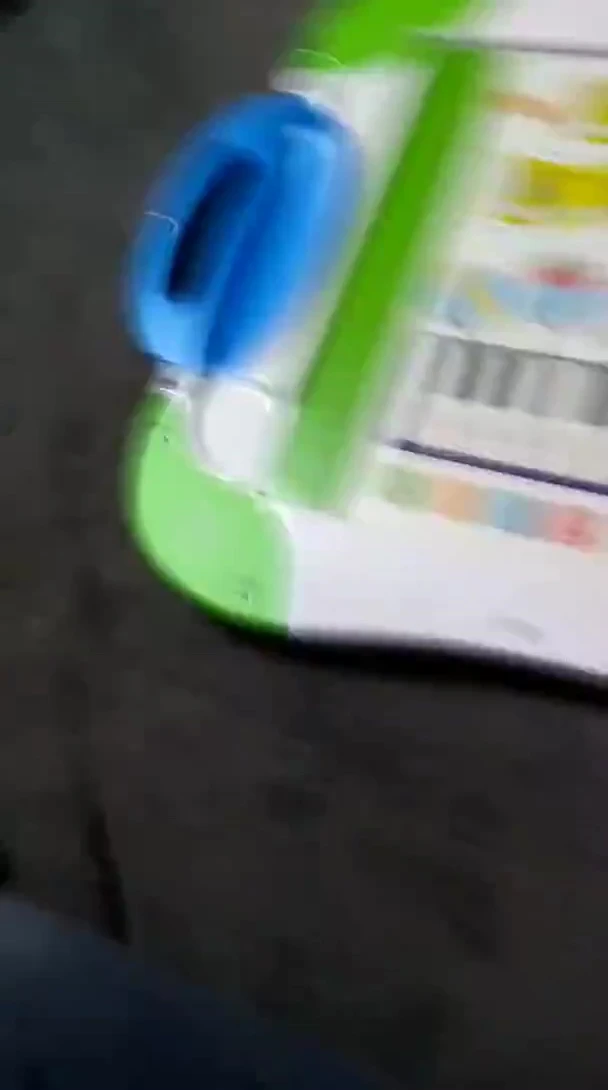 The ‘Trolls’ book opened to a page of activities.