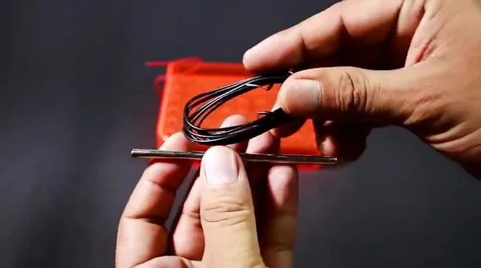 Test the electromagnet with an iron pin.