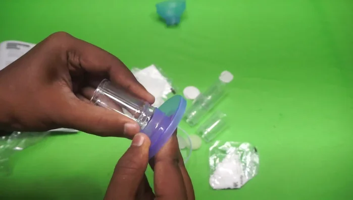 Insert the filter layers into the filter tube. Ensure that each layer is evenly distributed to prevent clogging.