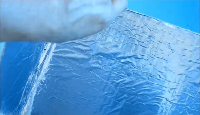 Make holes and adjust the angle: Once the glue dries, make holes in the reflector and use wire to adjust the angle for optimal sunlight reflection.