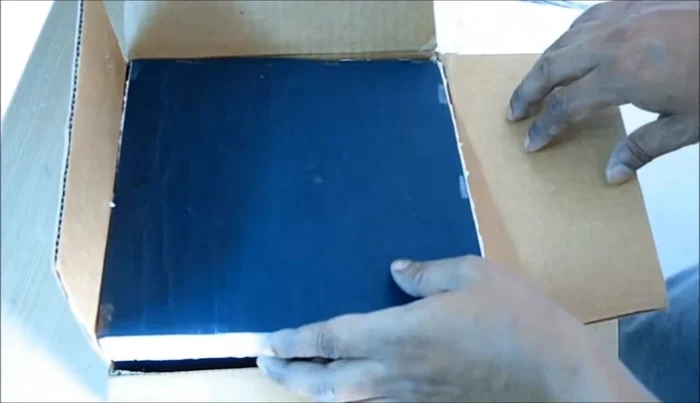 Assemble the walls: Glue the four thermal sheets to the sides of the box base.