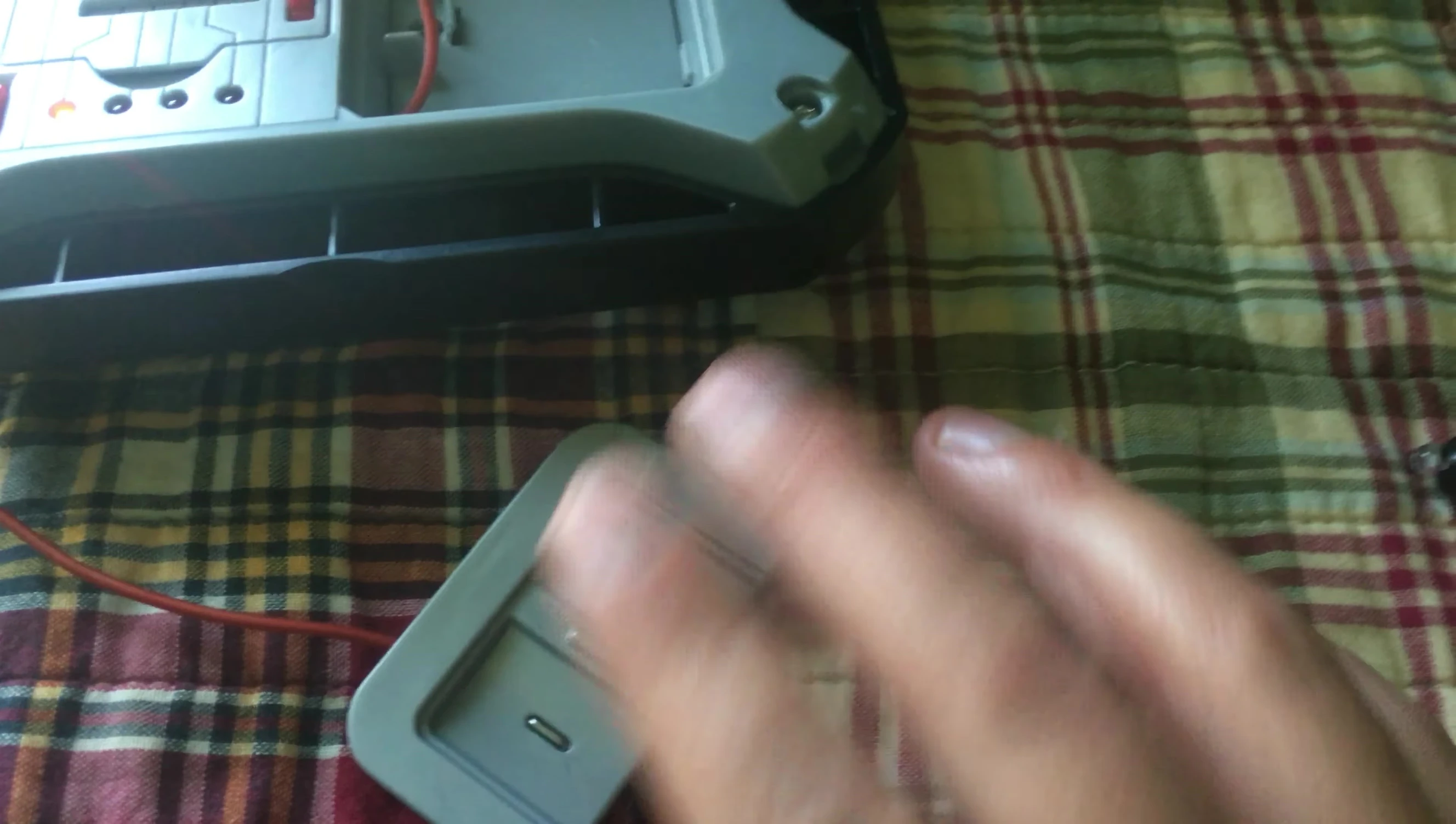 Hands placed on the lie detector sensors