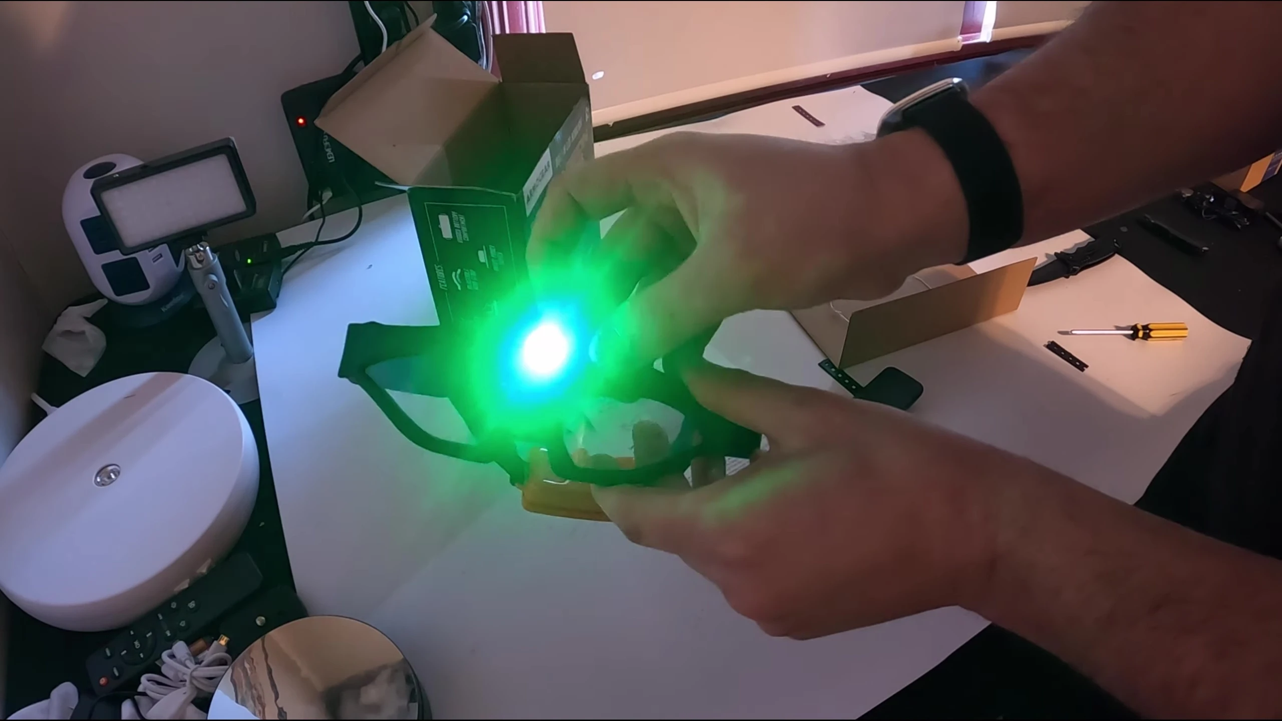 Someone adjusting the angle of the goggles