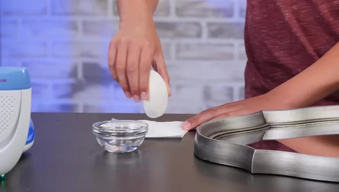 The message will be revealed when the mirror steams up; wash it off afterward.