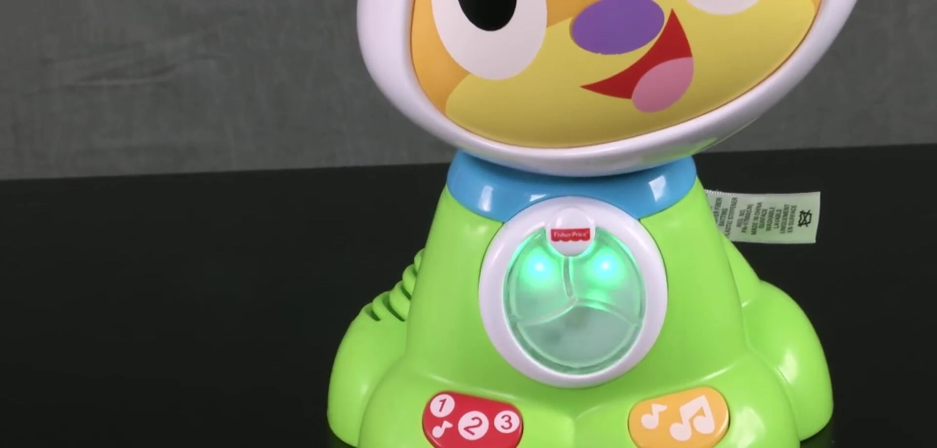 Close-up of the BeatBowWow toy's large buttons.