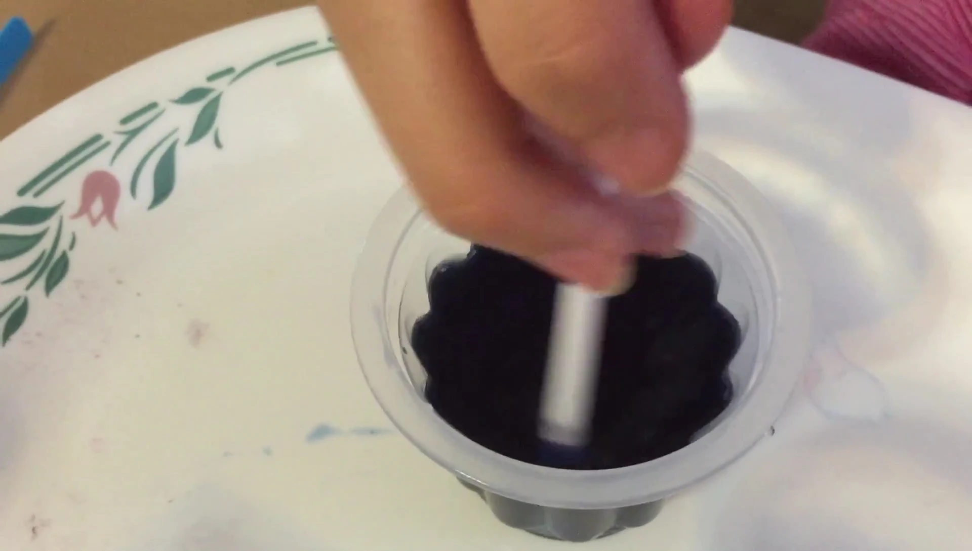 The blue color change after adding baking soda