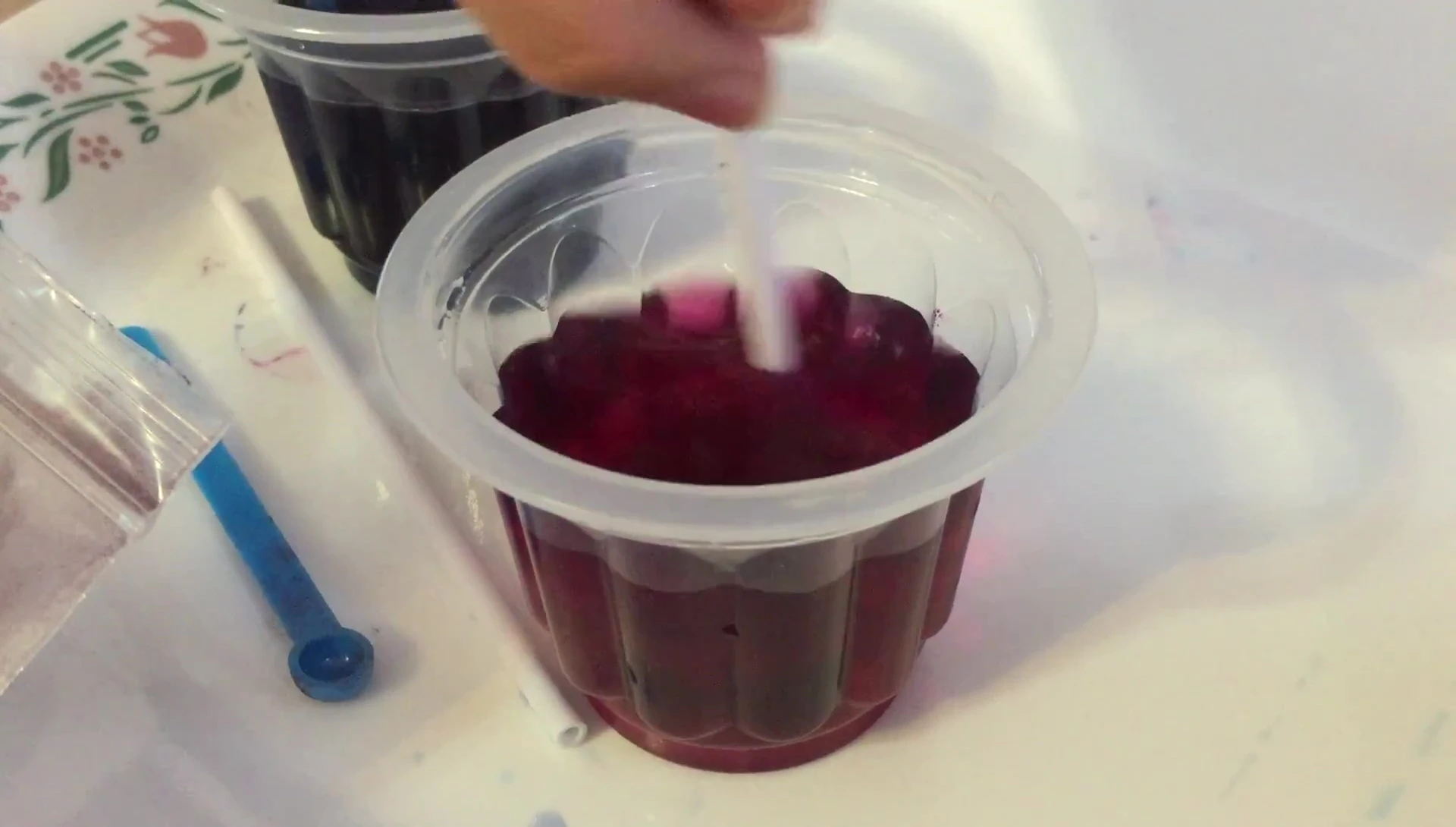 The pink color change after adding citric acid