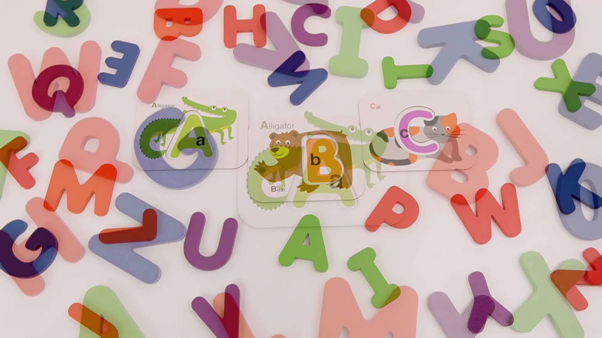 Close-up shot of a flashcard with the letter 'A' on it.