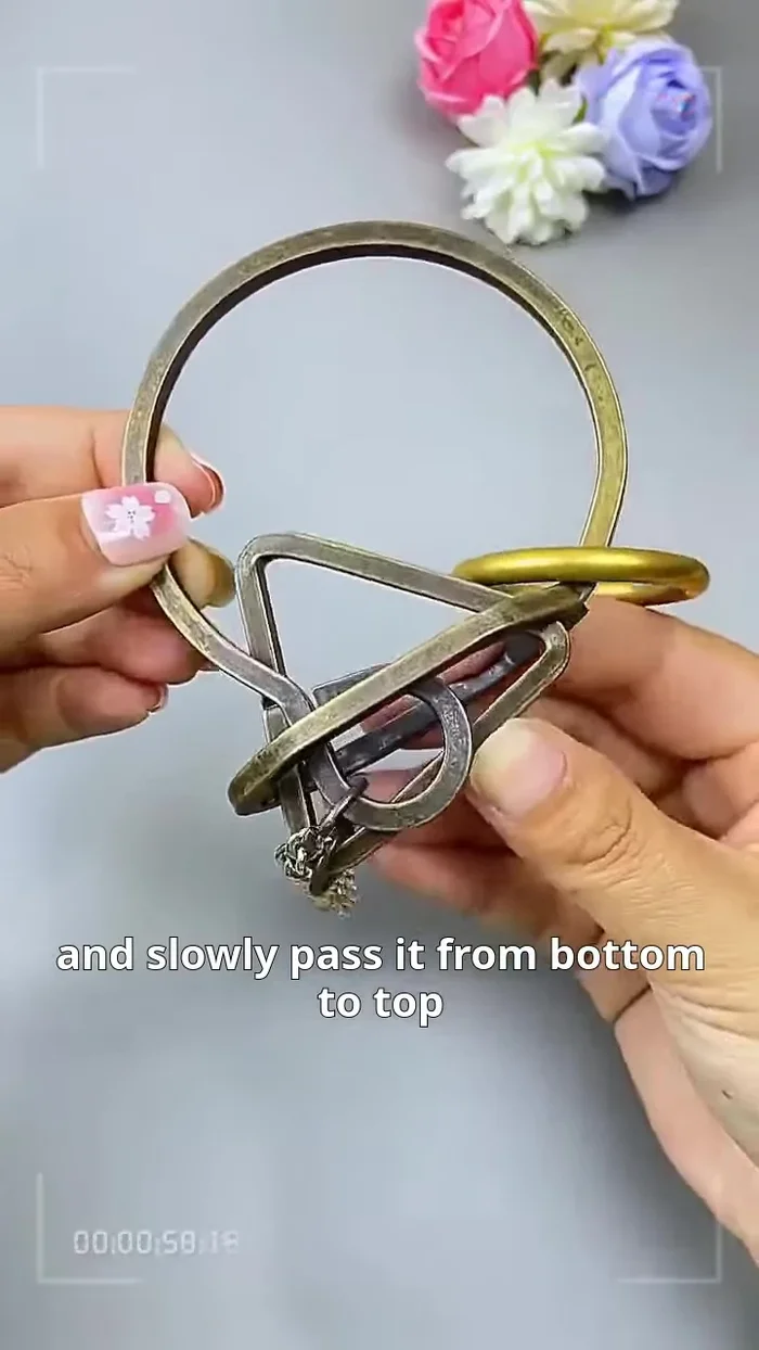 Set aside the triangle ring and chain: Clear the path for the gold ring.