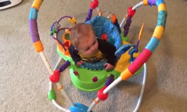 Clay happily playing in the jumper