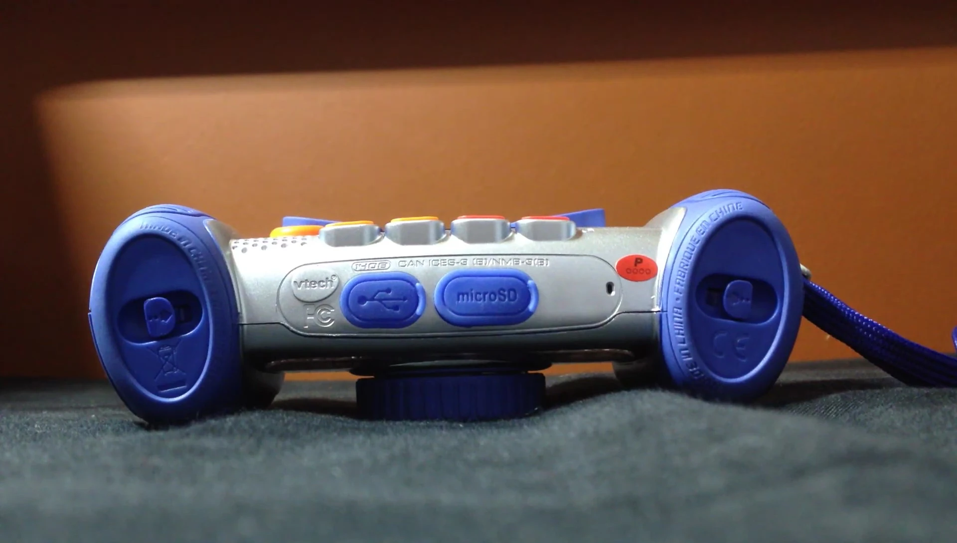 A shot possibly showing an older VTech Kidizoom model interface for comparison (if present in video)