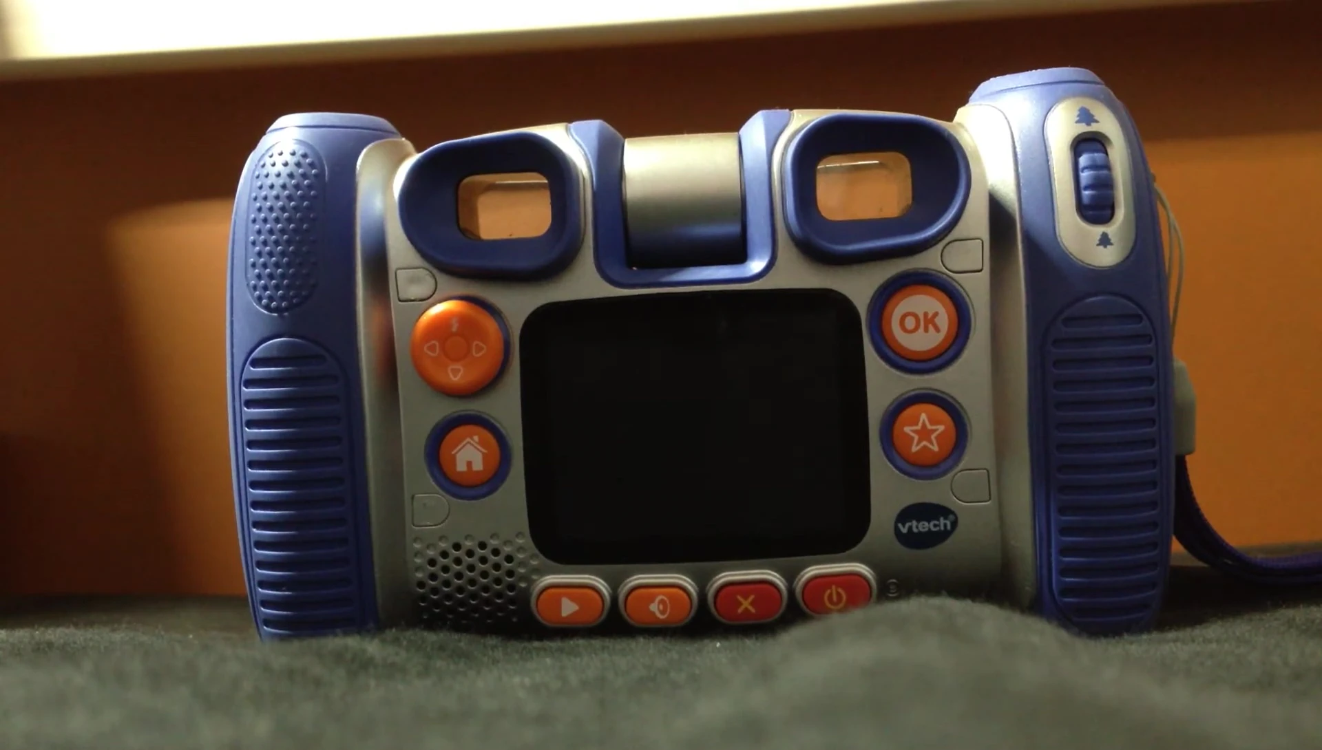 Close-up of the VTech Kidizoom Twist Plus camera showing its buttons and design