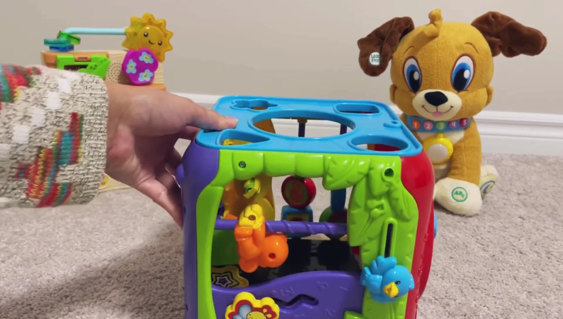 The shape cutouts on the back of the activity cube.