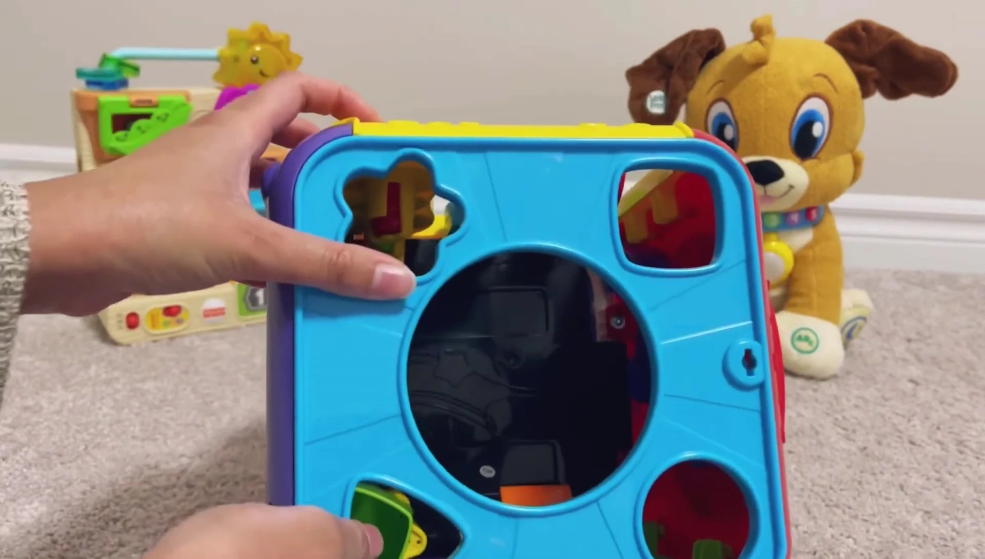 The shaped blocks included with the activity cube.