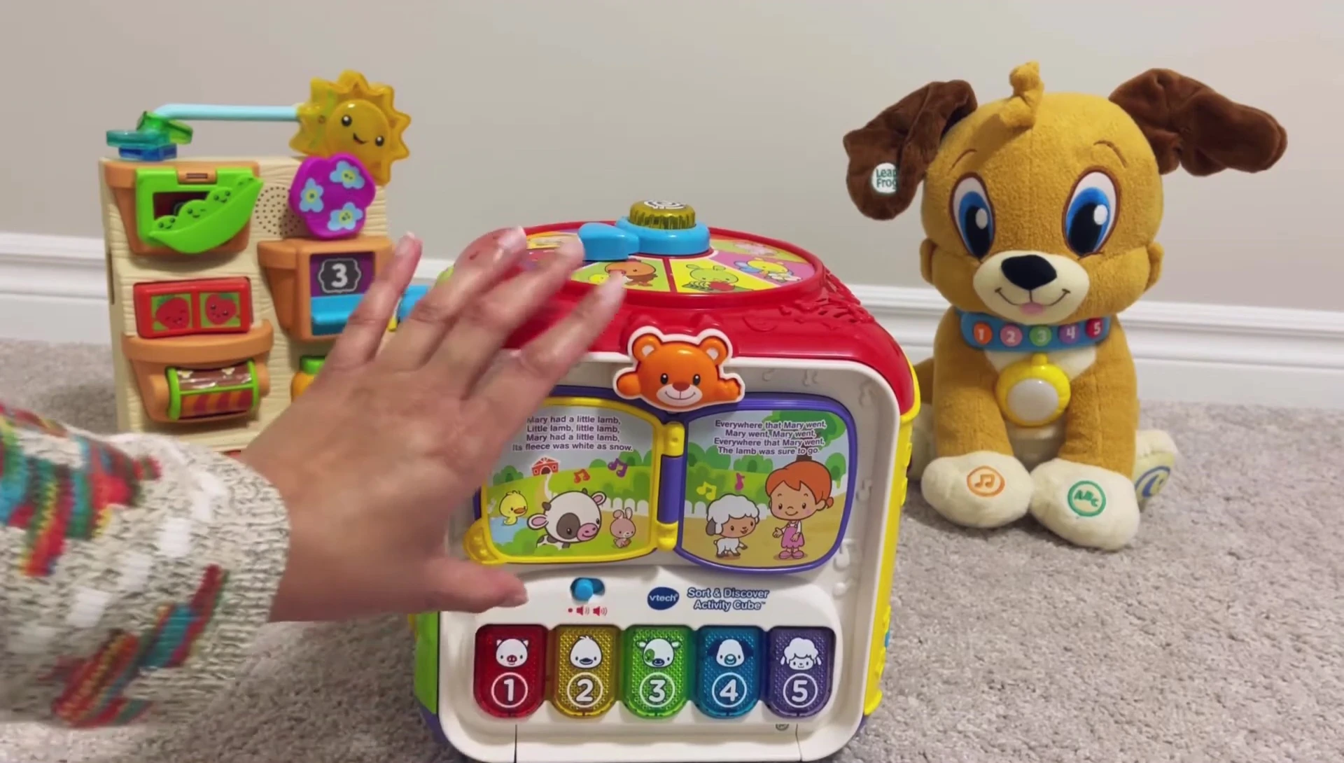Close-up of the volume buttons on the VTech activity cube.
