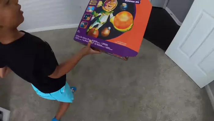 Paint the foam balls to represent the planets (using colors and details as instructed or creatively).