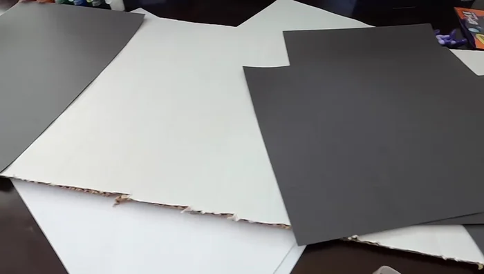 Sponge on blue paint to create a space background on the board.