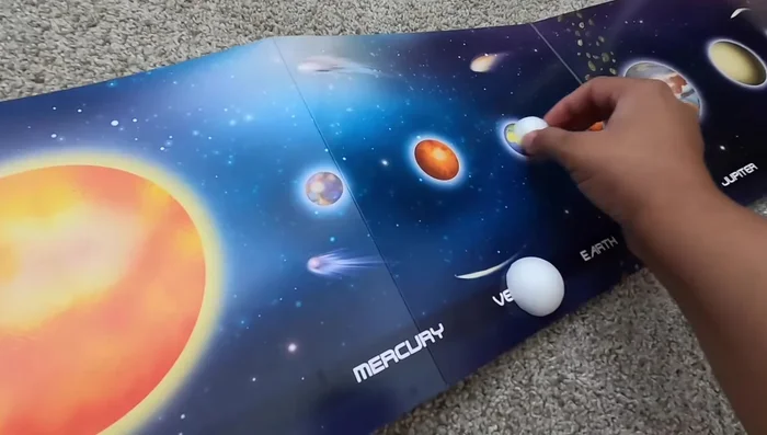 Match the foam balls to the planets shown on the included poster.