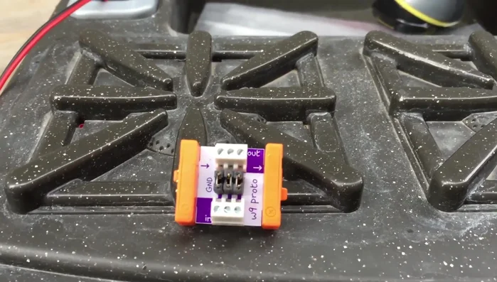 Connect the Proto bit's ground and signal to the pump's ground and positive.