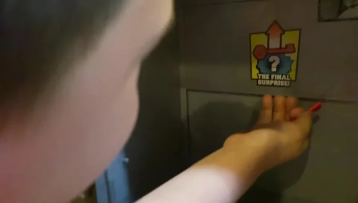 Use the key to unlock any additional compartments within the vault.