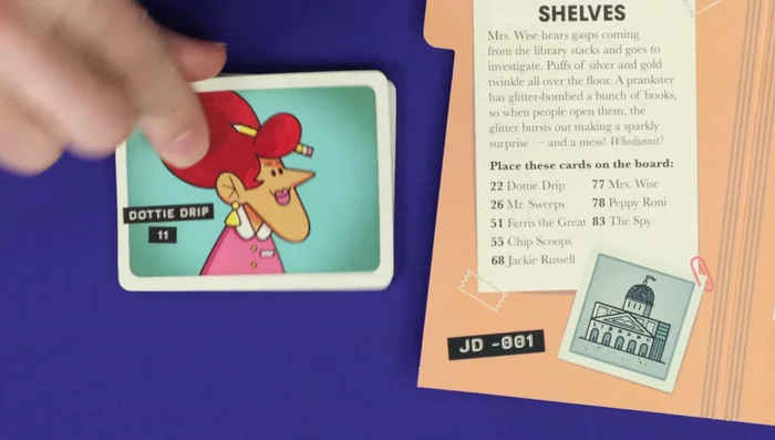 Shuffle the sleuth cards and place them near the board. Give each player a pen/pencil, a notepad page, and ensure they can see the suspect boards.