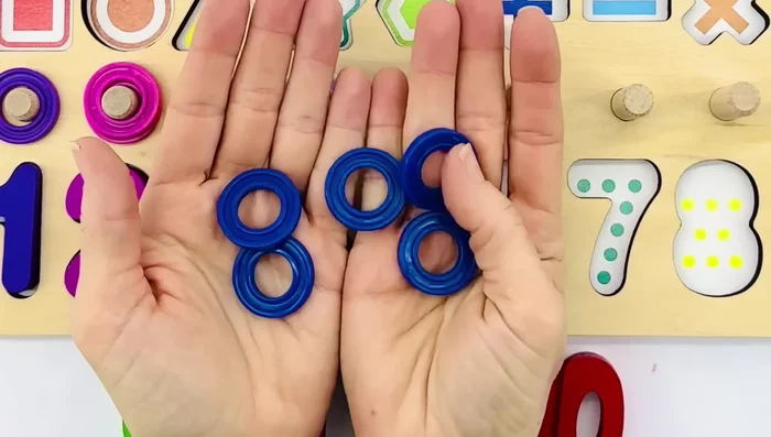 Count five blue rings.