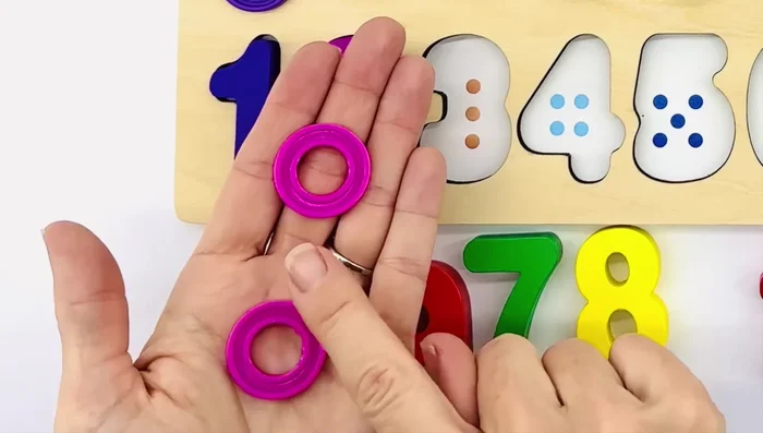 Count two pink rings.