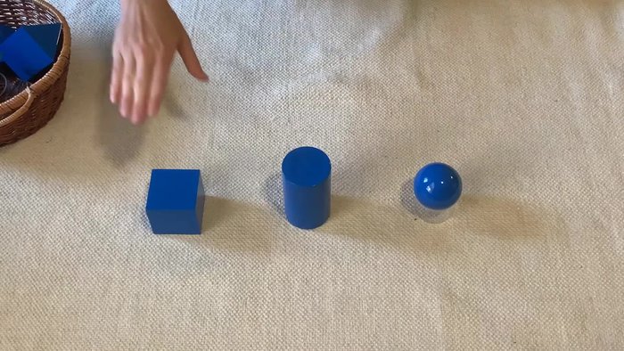 Introduce the triangular prism: explain its characteristics (two triangular bases).