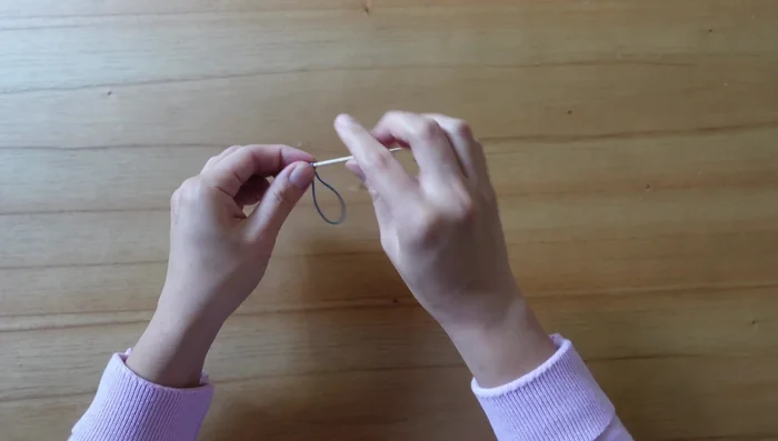 Break the other end of the toothpick once tight and secure.